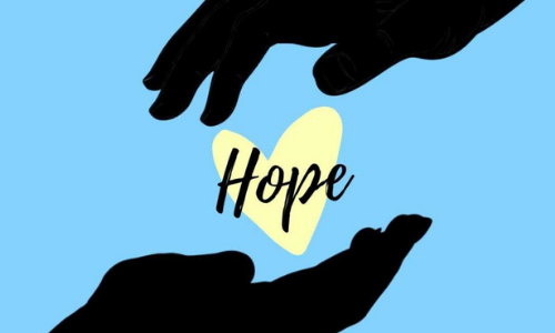 Hands holding a heart that says "Hope"